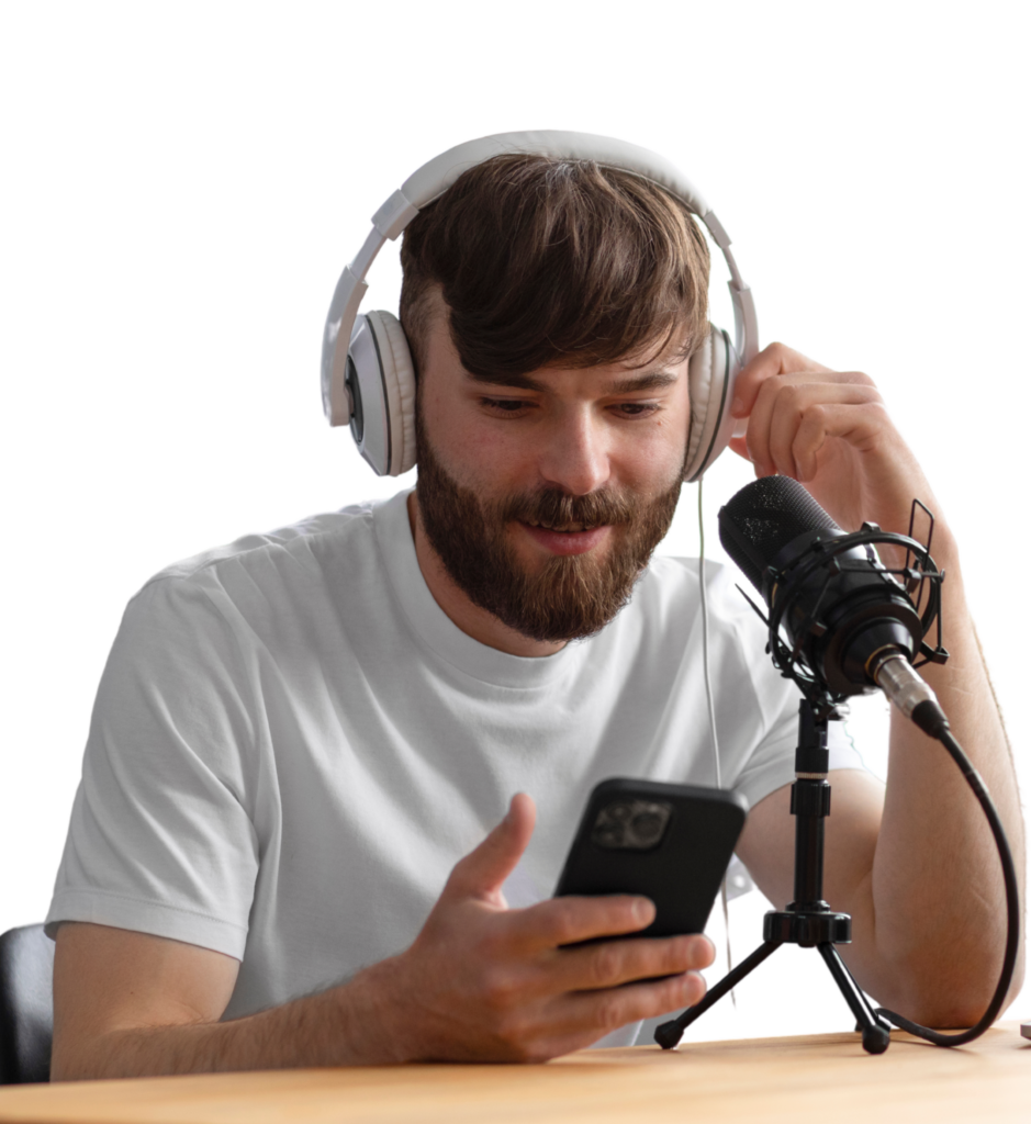 Young man wearing headphones, engaged in podcasting with a smartphone and microphone, reflecting themes of mentorship and career growth from Blueprints & Beginnings.